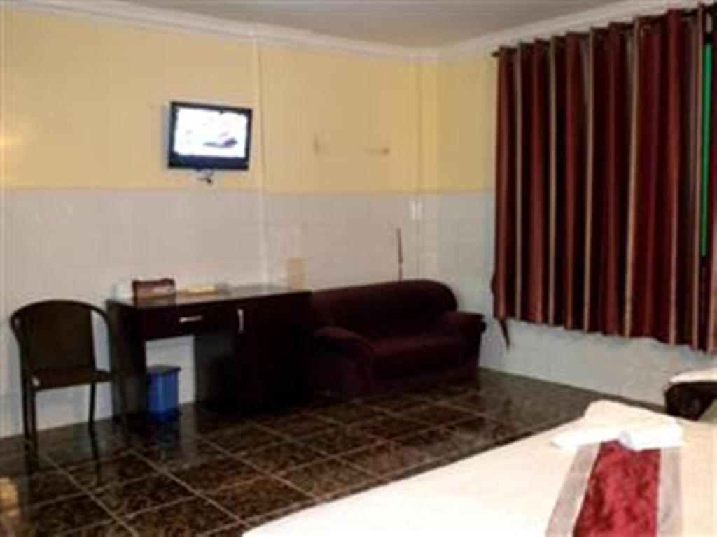 Golden Boat Guesthouse Phnom Penh Zimmer foto